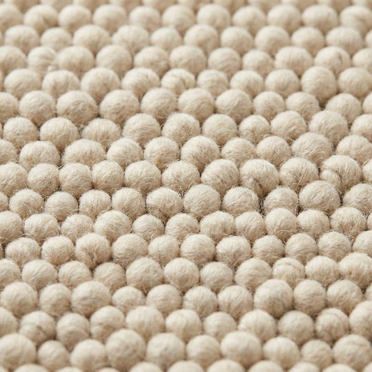 Chunky wool rug handwoven cream textured neutral Scandinavian modern area rug