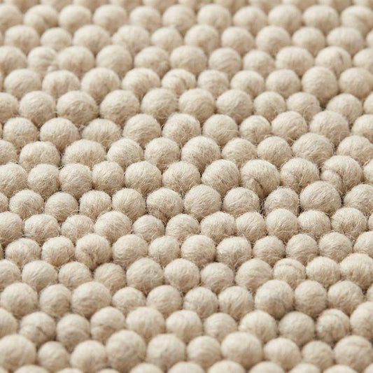 Chunky wool rug handwoven cream textured neutral Scandinavian modern area rug