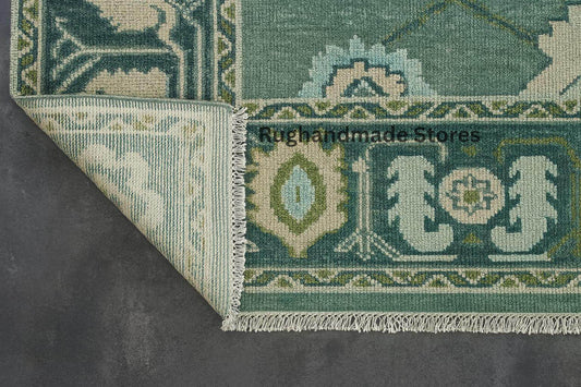 Hand-knotted Oushak wool rug with vintage Turkish floral design in green and blueish tones for living room decor