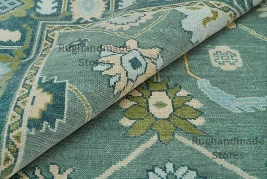 Hand-knotted Oushak wool rug with vintage Turkish floral design in green and blueish tones, perfect for living room decor.