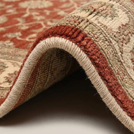 Close-up of hand knotted wool rug showing dense knot structure, soft wool fibers, and detailed floral weaving texture __etsy:7958068749