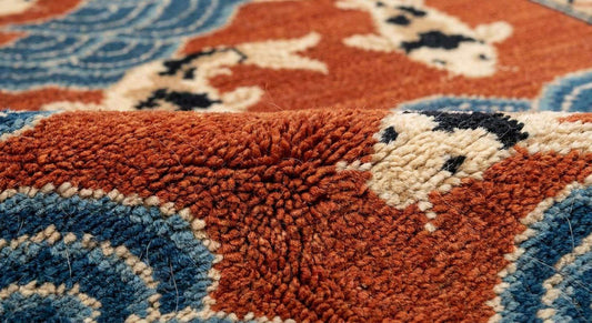 Hand knotted wool runner rug with Japanese koi fish and traditional oriental design in rust orange and navy blue colors
