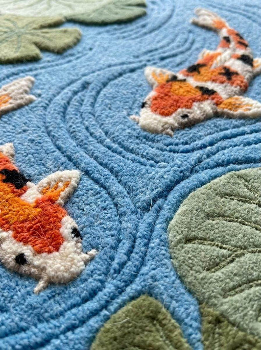 Hand tufted koi fish runner rug with organic pond design, water lily decor, in blue and green tones