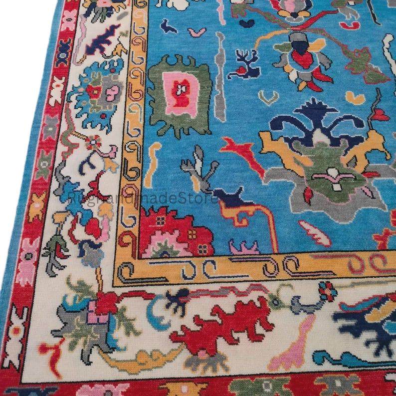 Handmade Oushak wool rug with dark blue floral Turkish knot design, 8x10 area rug