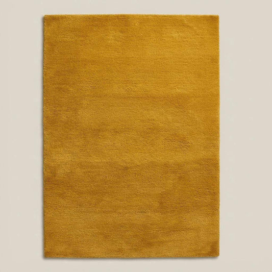Mustard yellow area rug with retro mid century design and soft low pile texture for modern living room decor