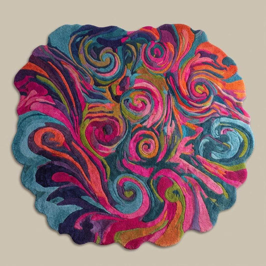 Hand tufted psychedelic swirl rug with wavy edges and vibrant colors for modern living rooms