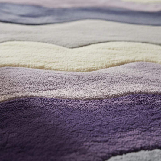 Lavender freeform rug with sculptural tufted 3D texture and organic shape in purple gradient colors