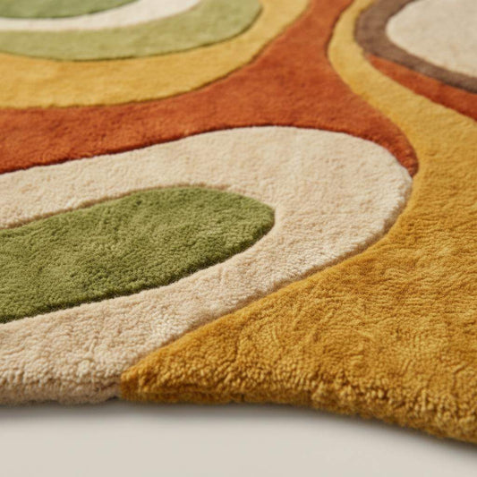 Close up of high pile hand tufted wool rug showing plush fibers, carved texture, and dense craftsmanship