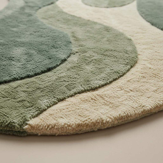 Organic shape area rug in sage green with plush abstract design for modern living room and bedroom décor