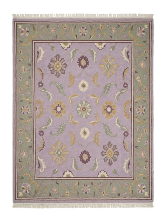 Lavender Floral Rug with a pale lilac field, multicoloured floral motifs, sage green vine border and fringe