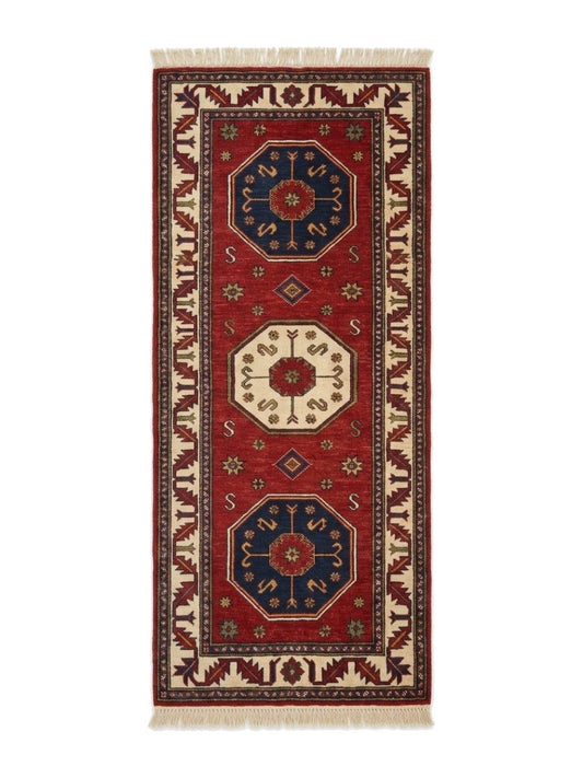 Red Kazak Runner Rug with a red wool field, navy and ivory octagonal medallions, geometric motifs and patterned border