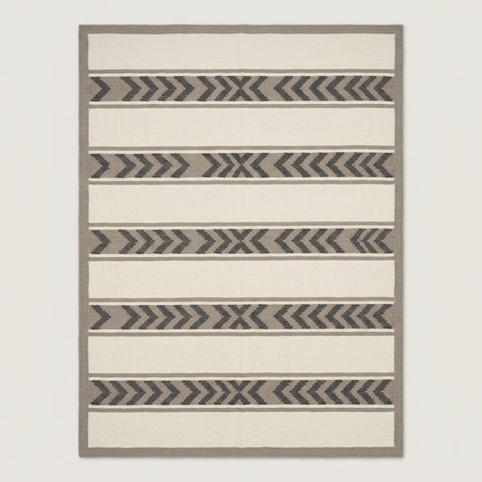 Southwestern Flatweave Wool Rug with ivory bands, taupe borders and charcoal chevron stripes in a flatwoven design.
