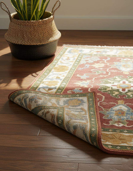 Vintage Oushak wool rug with muted rust, cream, and sage medallion design, hand-knotted 8x10 area carpet