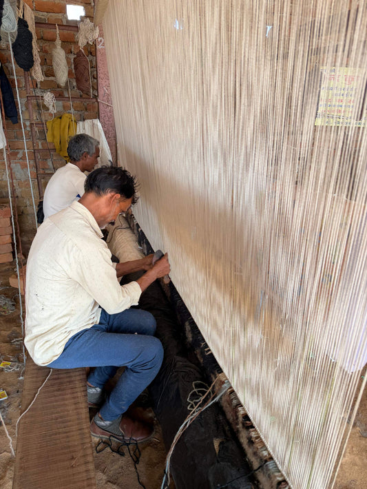 Bhadohi carpet with GI tag certification symbol indicating authentic regional craftsmanship and quality