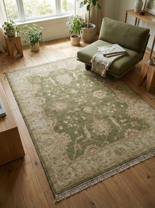 Hand-knotted Turkish Oushak rug with muted colors and floral motifs