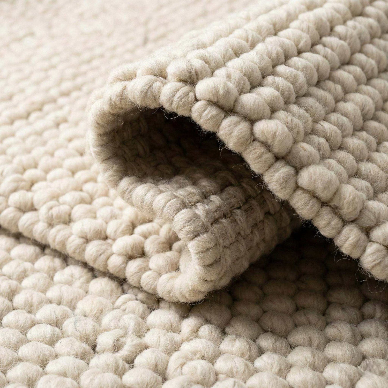 Handmade ivory rugs adding warmth and sophistication to modern interiors