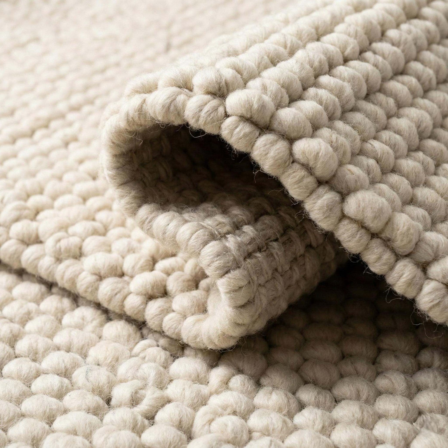 Handmade ivory rugs adding warmth and sophistication to modern interiors