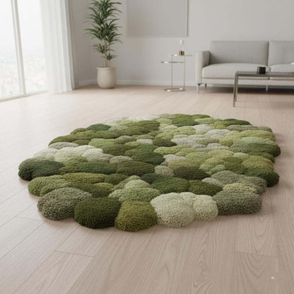 Green 3D moss rug with textured pebble design and soft cushioned surface, handmade tufted organic area rug.