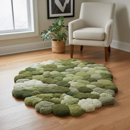 Round green 3D moss rug with textured handmade tufted surface mimicking forest floor organic area carpet