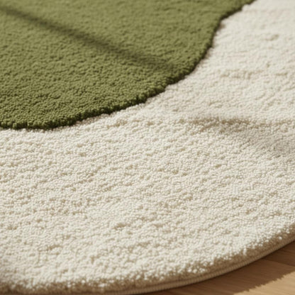 Round 3D moss stone rug with green and grey textured carpet for boho and minimalist decor