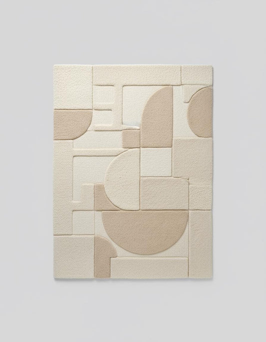 3D textured geometric area rug in beige and cream with modern carved design