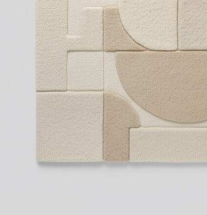 3D textured geometric area rug in beige and cream with carved design for modern interiors