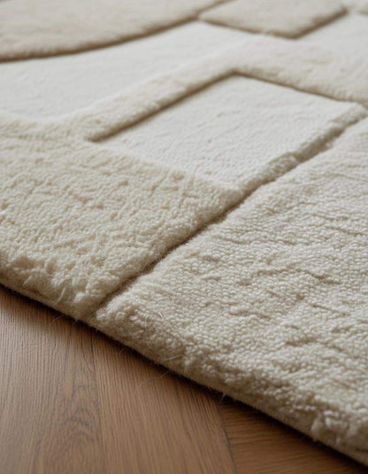 3D textured geometric area rug in beige and cream for modern home décor