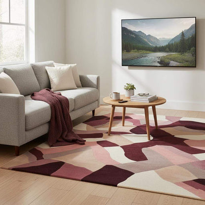 Abstract area rug in burgundy, blush, and mauve with geometric organic shapes, 9x12 feet large carpet for modern living rooms