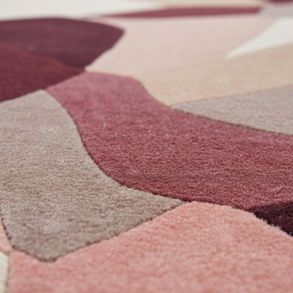 Abstract area rug in burgundy blush mauve geometric design for modern living rooms