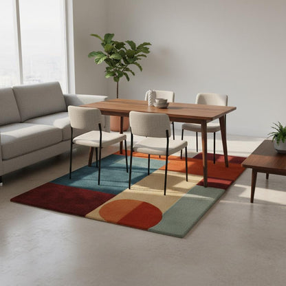 Abstract geometric rug with teal and orange mid century modern design and plush pile carpet
