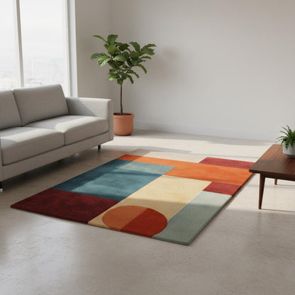Abstract geometric rug with teal and orange mid century modern design and plush pile carpet
