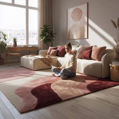 Abstract wavy area rug with burgundy, blush, and cream tones in a 9x12 plush cut pile design for living rooms