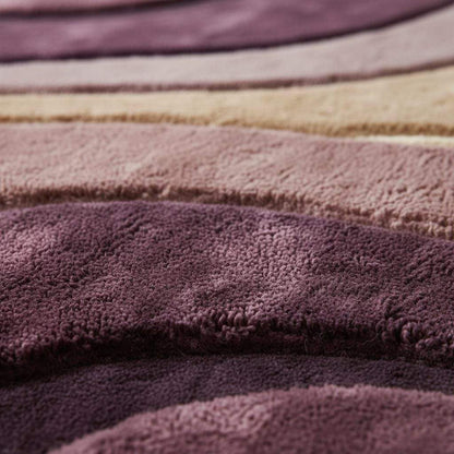 Close-up of hand tufted rug showing plush high pile texture, carved wave pattern, dense fibers, and soft surface detailing created by artisan craftsmanship. __etsy:7568836853