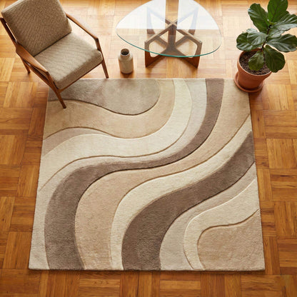 Abstract wavy area rug in neutral beige with sculpted modern wave pattern for contemporary interiors