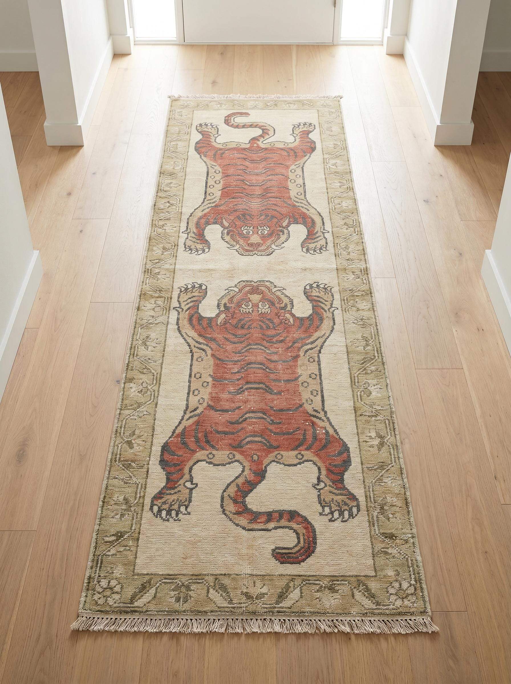 Hand knotted tiger runner rug featuring two bold tiger motifs on an ivory background with decorative floral border __etsy:8148324739