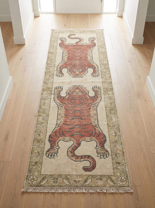 Hand knotted tiger runner rug featuring two bold tiger motifs on an ivory background with decorative floral border __etsy:8148324739