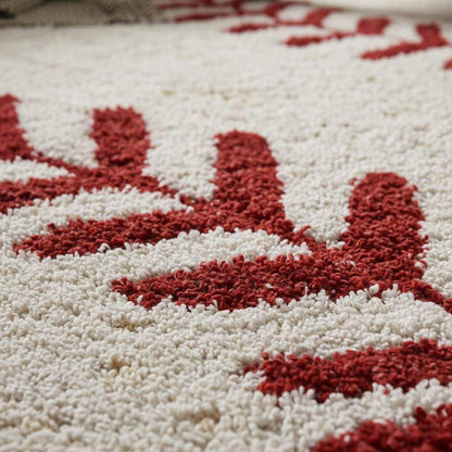 Hand-tufted round baseball rug with red stitching for kids' sports-themed rooms and nurseries