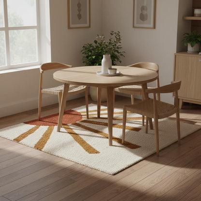 Neutral cream rug with bold sunrise pattern, perfect for cozy interiors.