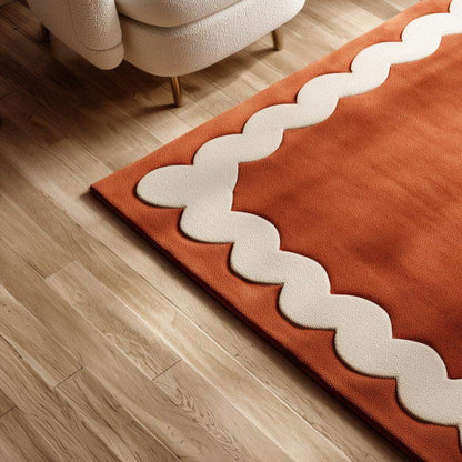 Burnt Orange Tufted Area Rug: Wavy Cream Border, Scandinavian Style