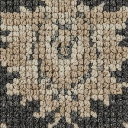Close-up of handmade woven pile showing wool-look fibers and floral pattern texture __etsy:7603906984