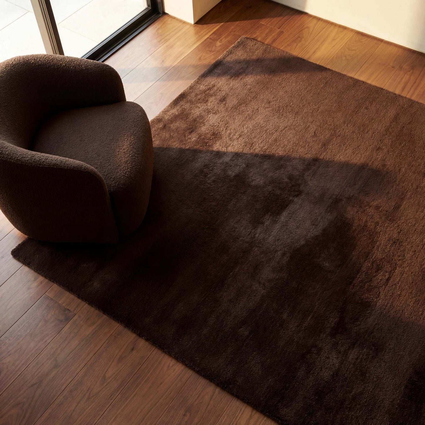 Chocolate brown plush area rug with smooth low pile in modern minimalist living room __etsy:7855847676