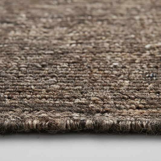 Handwoven chunk wool rug in neutral tones for cozy modern farmhouse and boho decor