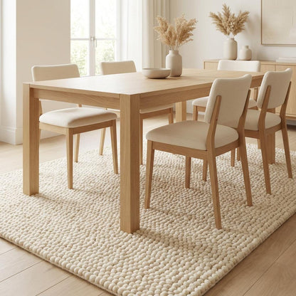 Chunky handwoven wool rug in neutral cream tone for Scandinavian minimalist decor