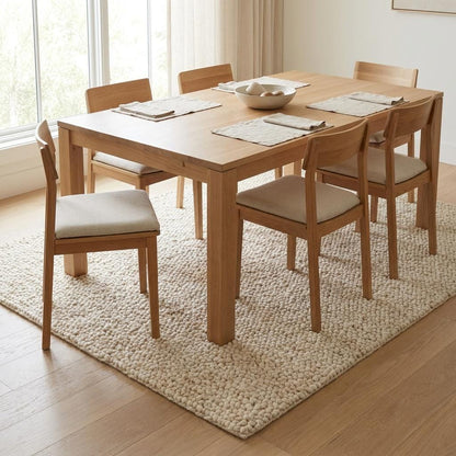 Handwoven chunky knit wool rug in soft ivory with thick loops, cozy texture for living room decor