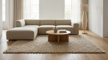 Chunky knit wool rug in cream beige with thick handmade textured loops for cozy home decor