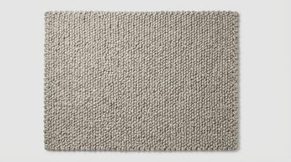 Chunky loop rug with thick, plush ivory texture for cozy modern living rooms