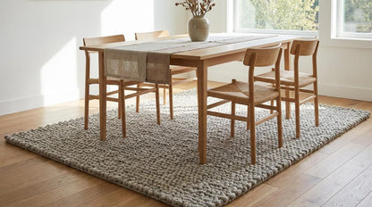 Chunky loop rug in neutral ivory with thick, textured plush surface for cozy modern living rooms