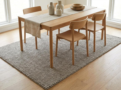 Chunky loop textured neutral area rug with thick yarn in cozy Scandinavian style