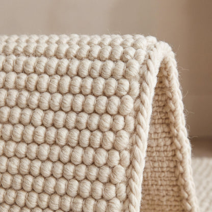 Cream chunky loop textured rug with thick handwoven cozy minimalist design