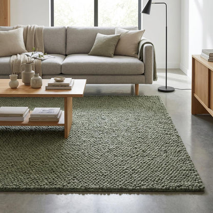 Chunky loop textured sage green rug with thick cozy organic loops for minimalist interiors